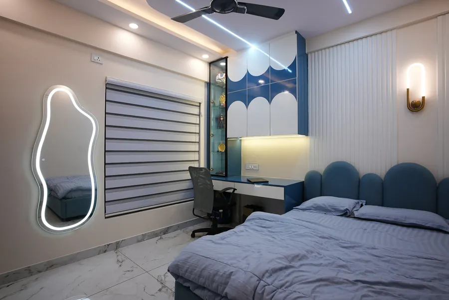 Kids bedroom with built-in storage in a Jayanagar home designed by Skyline Spaces